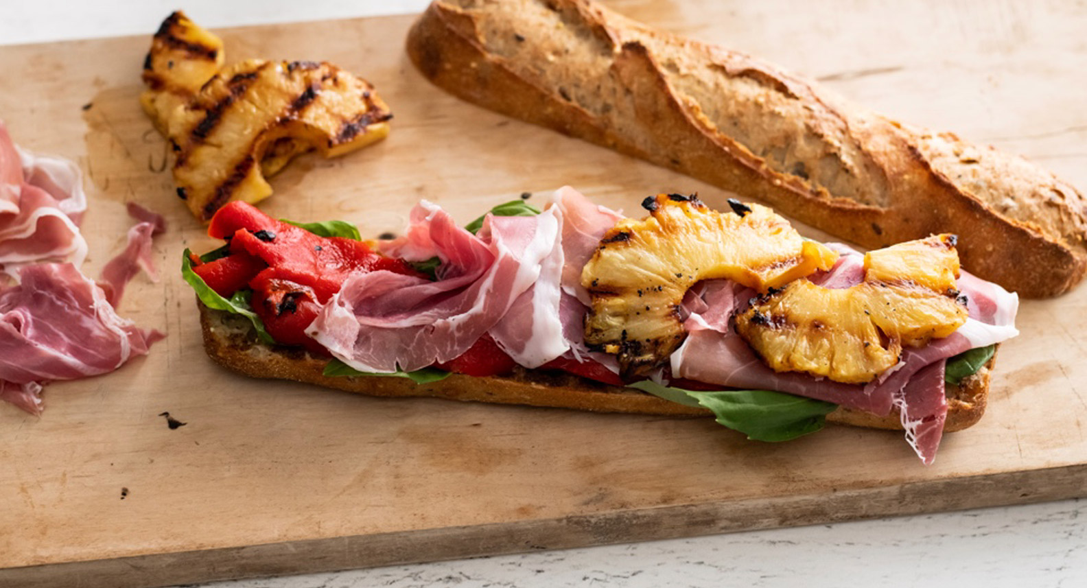 Prosciutto, Roasted Red Peppers, Grilled Pineapple, and Balsamic Sandwich