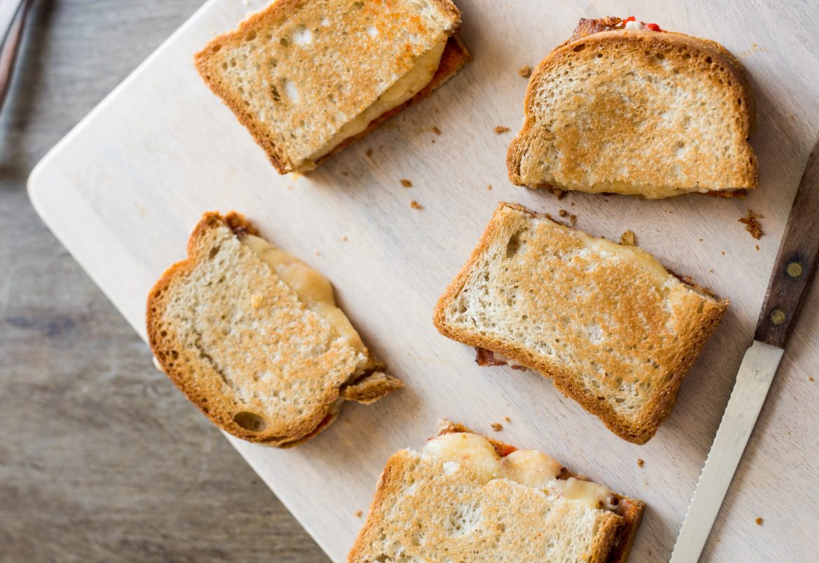 Premium Photo  Gluten free fresh bread in kitchen towel on light