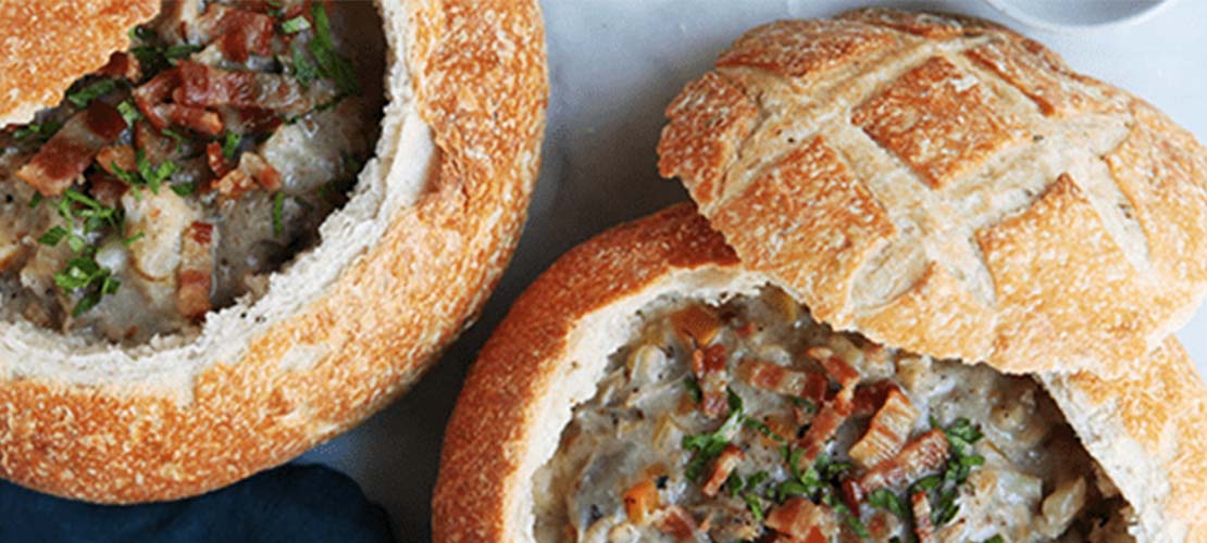 Overhead of soup in a bread bowl