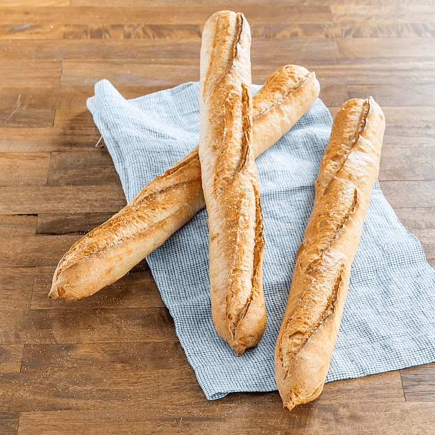Roasted Garlic Loaf sliced on a tray