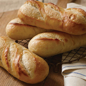 Roasted Garlic Loaf sliced on a tray