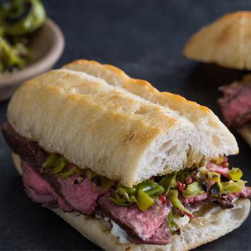 Open face hanger steak sandwich