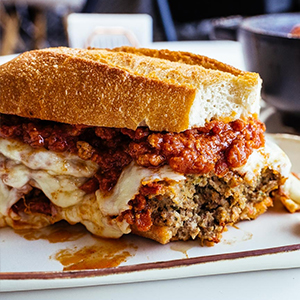 Meatball sub sandwiches with melted mozzarella