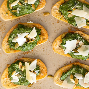 Toasted French Demi-Baguette slices topped with Parmesan Spinach Dip