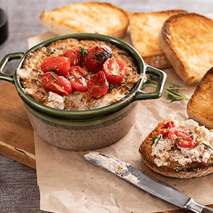 Bowl of Sweet Onion Dip with sliced Italian Round Loaf