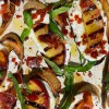 Grilled Crostini with Ricotta, Peaches, Prosciutto, and Hot Honey