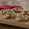 Sourdough Baguette Toast Appetizer with Brie, Cranberries and PIstachios