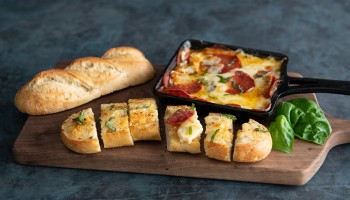 Molten Pepperoni Cheese Dip with Garlic Bread