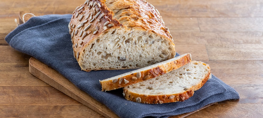Sliced loaf of Toasted Sunflower Honey artisan bread