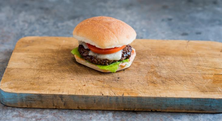 Cheddar cheeseburger slider on a tray