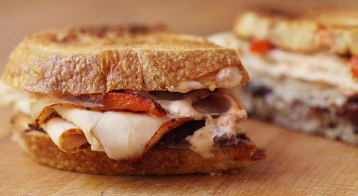 Turkey Melt with Olive, Tomato and Roasted Pepper Mayonnaise