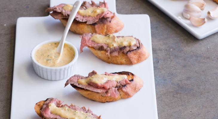 Open Face Hanger Steak with rosemary and grilled garlic bread