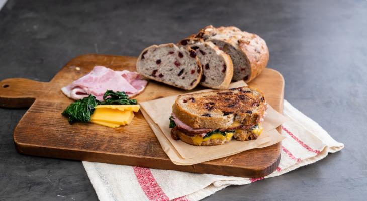 Maple Glazed Ham and Greens Grilled Cheese on Cranberry Walnut Loaf