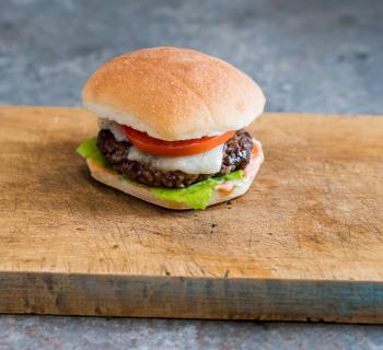 Cheddar cheeseburger slider on a tray