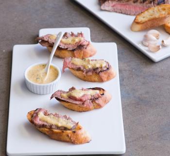 Open Face Hanger Steak with rosemary and grilled garlic bread