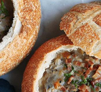 Overhead of soup in a bread bowl