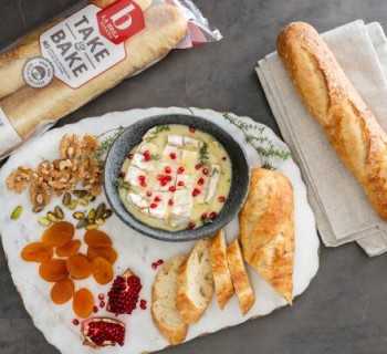 Valentine's Day food spread with loaves of artisan bread